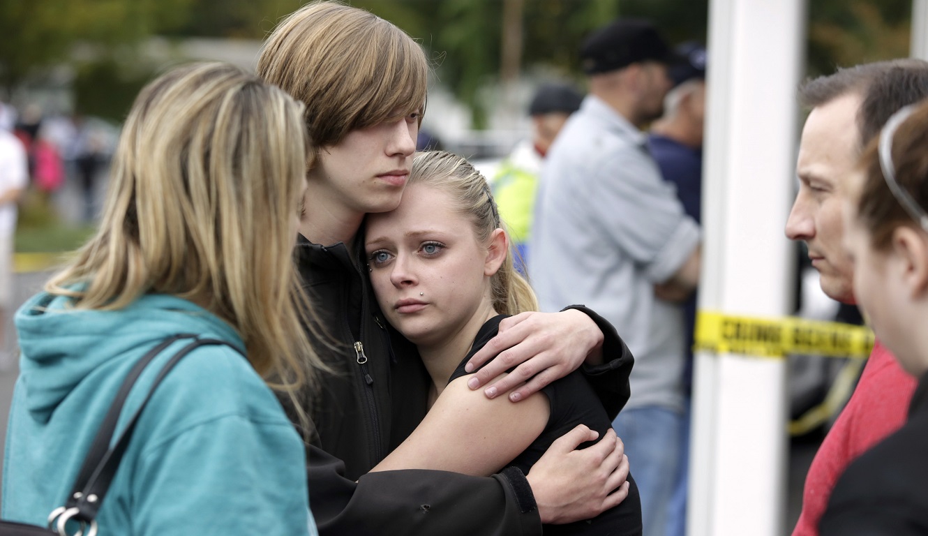 Students and family members reunite at Shoultes Gospel Hall after a student opened fire at Marysville-Pilchuck High School in Marysville, Washington